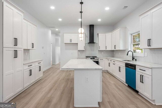 1569 Montreat Ave SW, Atlanta, GA 30311 - kitchen with visible vents, wall chimney exhaust hood, dishwasher, a sink, and stainless steel stove