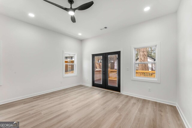 1569 Montreat Ave SW, Atlanta, GA 30311 - spare room with light wood-type flooring, recessed lighting, french doors, a ceiling fan, and visible vents