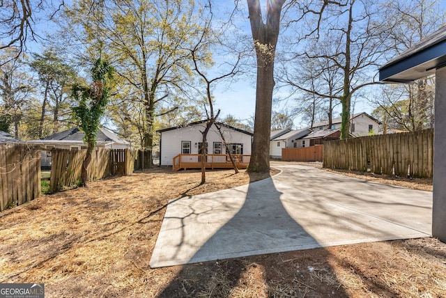 1569 Montreat Ave SW, Atlanta, GA 30311 - view of yard featuring a deck, a residential view, and fence private yard