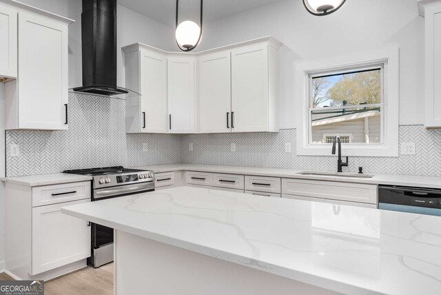 1569 Montreat Ave SW, Atlanta, GA 30311 - kitchen with wall chimney range hood, a sink, electric range, and white cabinetry