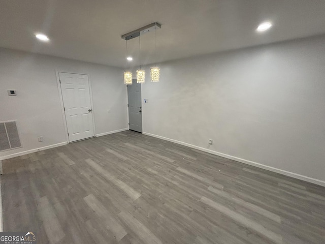 3685 Rice Mill Rd, Macon, GA 31206 - unfurnished dining area featuring recessed lighting, baseboards, and dark wood-style flooring