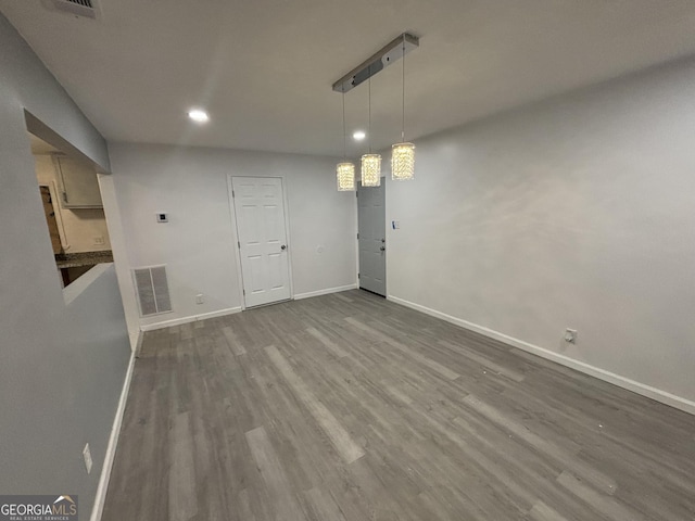 3685 Rice Mill Rd, Macon, GA 31206 - unfurnished dining area with baseboards, dark wood-type flooring, and recessed lighting