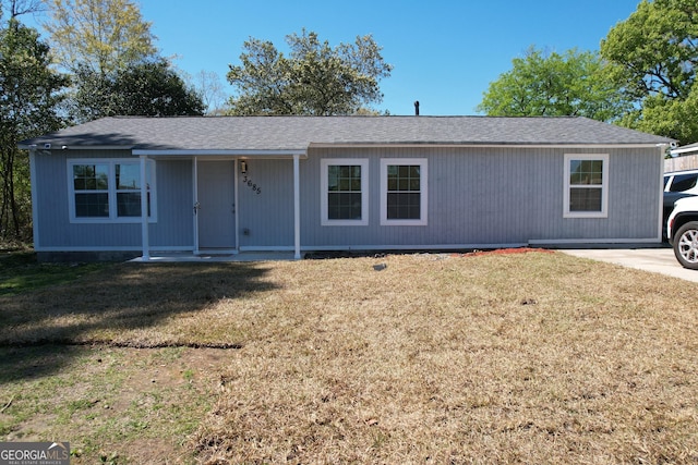 3685 Rice Mill Rd, Macon, GA 31206 - ranch-style home with a front lawn, a porch, and roof with shingles