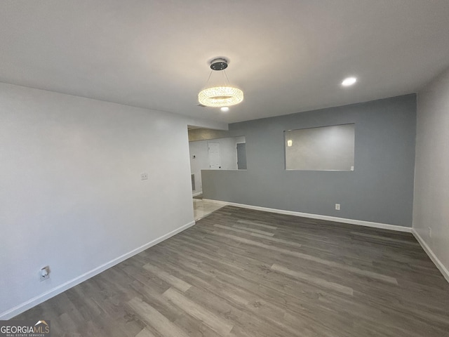 3685 Rice Mill Rd, Macon, GA 31206 - basement with baseboards, wood finished floors, and recessed lighting