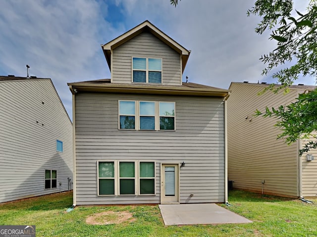 3741 Upland Dr, Mcdonough, GA 30253 - rear view of house featuring a patio and a lawn