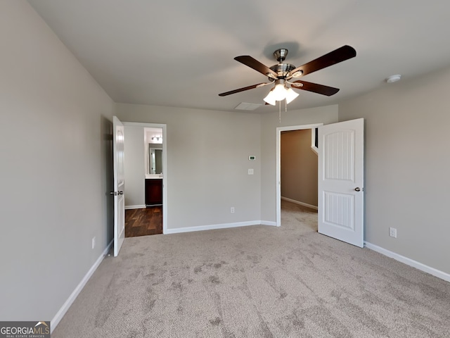 3741 Upland Dr, Mcdonough, GA 30253 - unfurnished bedroom featuring carpet, baseboards, and ceiling fan