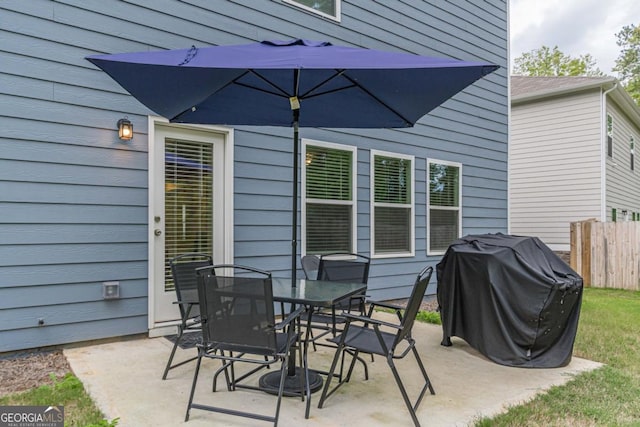 9061 Jim Purcell Dr, Covington, GA 30014 - view of patio / terrace with a grill and outdoor dining area