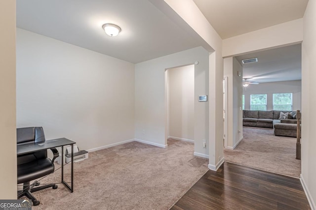 9061 Jim Purcell Dr, Covington, GA 30014 - office featuring carpet, a ceiling fan, and wood finished floors