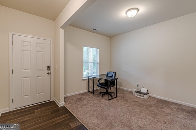 9061 Jim Purcell Dr, Covington, GA 30014 - unfurnished office with dark colored carpet and dark wood finished floors