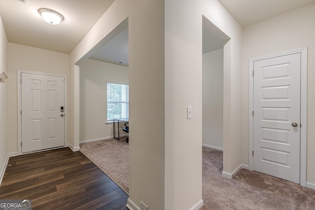 9061 Jim Purcell Dr, Covington, GA 30014 - entryway with baseboards and dark colored carpet