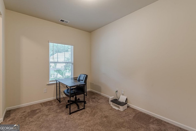 9061 Jim Purcell Dr, Covington, GA 30014 - unfurnished office featuring carpet floors and baseboards