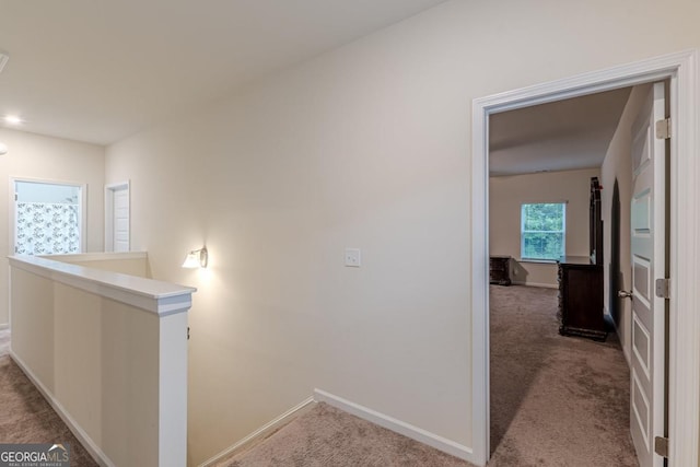 9061 Jim Purcell Dr, Covington, GA 30014 - hallway featuring an upstairs landing and carpet
