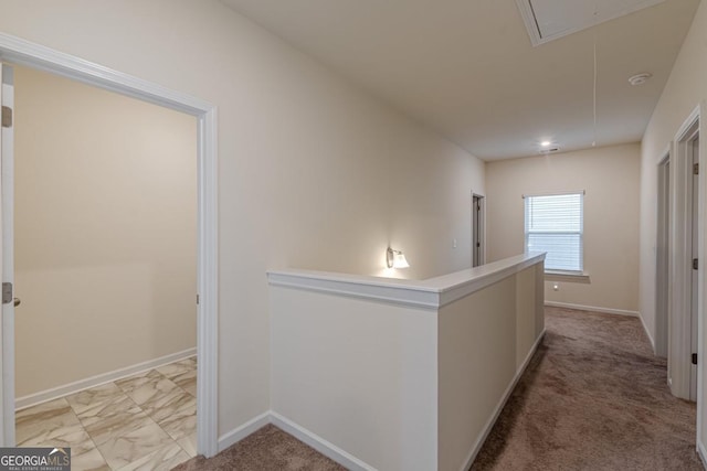 9061 Jim Purcell Dr, Covington, GA 30014 - hallway with attic access and light carpet