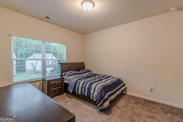 9061 Jim Purcell Dr, Covington, GA 30014 - bedroom featuring light colored carpet