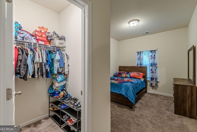 9061 Jim Purcell Dr, Covington, GA 30014 - bedroom featuring carpet floors and baseboards