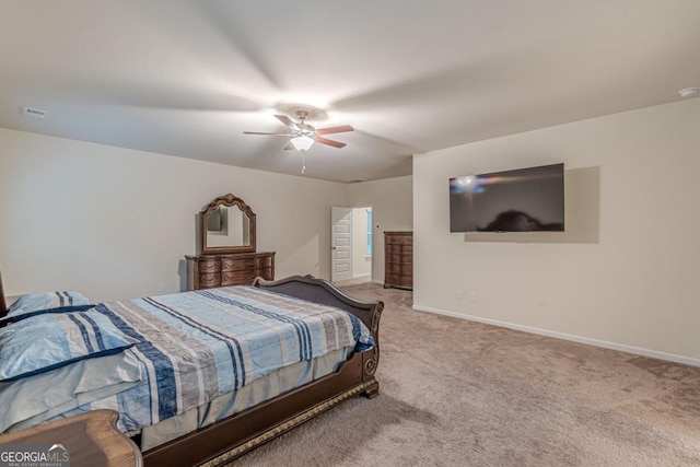 9061 Jim Purcell Dr, Covington, GA 30014 - bedroom featuring carpet and a ceiling fan