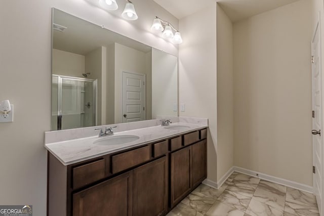 9061 Jim Purcell Dr, Covington, GA 30014 - bathroom with double vanity, a shower with door, and marble finish flooring