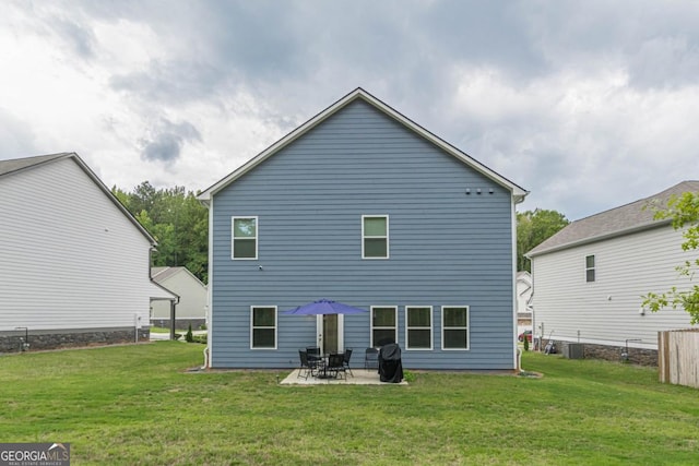 9061 Jim Purcell Dr, Covington, GA 30014 - back of house with a yard and a patio area