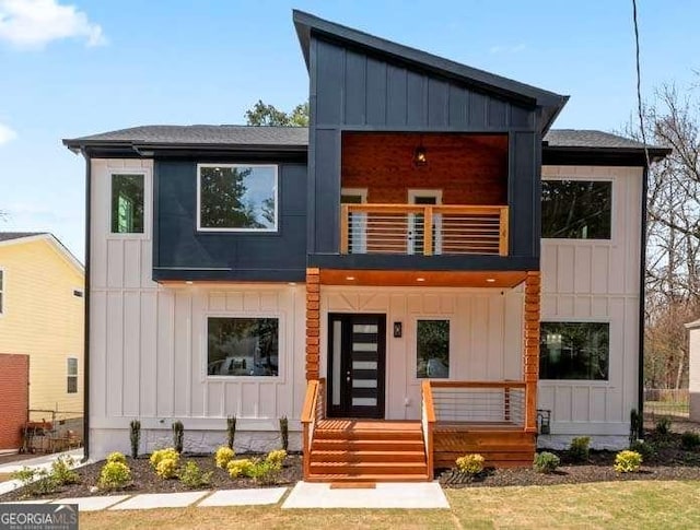 387 S Howard St SE, Atlanta, GA 30317 - contemporary home featuring a balcony, board and batten siding, and a porch
