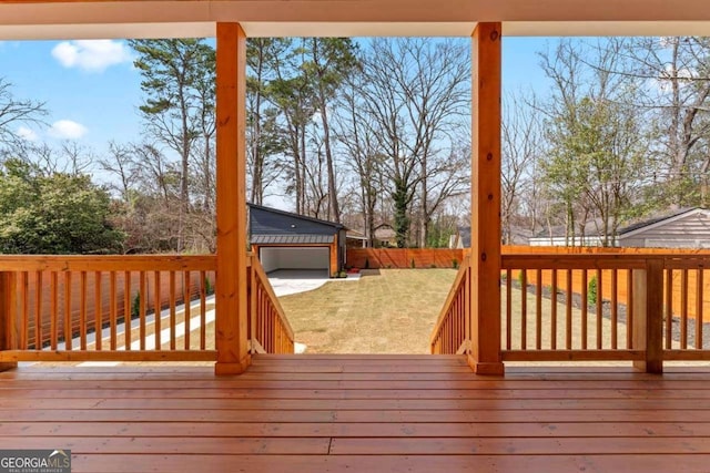387 S Howard St SE, Atlanta, GA 30317 - wooden terrace featuring a fenced backyard and view of scattered trees