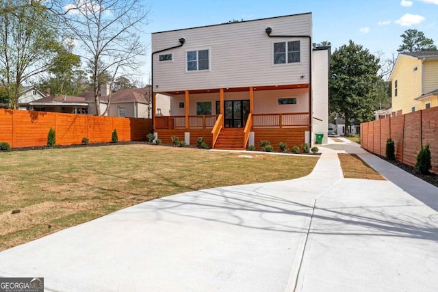 387 S Howard St SE, Atlanta, GA 30317 - rear view of house with covered porch and stairway