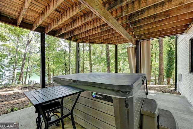 view of patio / terrace featuring a hot tub