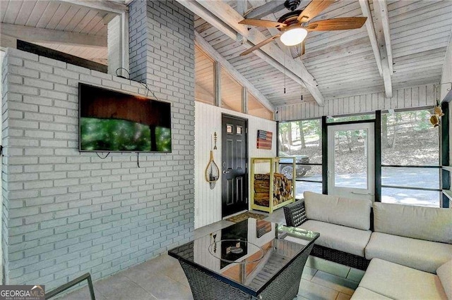 sunroom with outdoor lounge area, ceiling fan, and beam ceiling