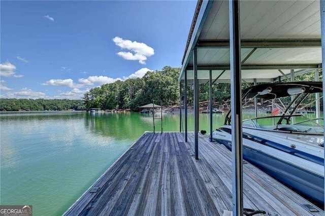 dock area featuring a water view