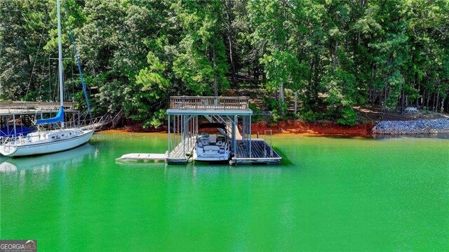view of dock with a water view