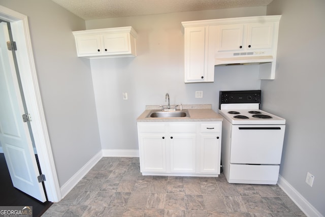 kitchen with white cabinetry, white electric stove, under cabinet range hood, and a sink