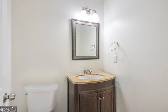 4785 Beaver Rd, Loganville, GA 30052 - bathroom with toilet and vanity