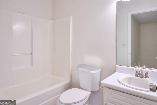 4785 Beaver Rd, Loganville, GA 30052 - bathroom with toilet, vanity, and tub / shower combination
