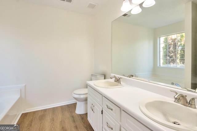 4785 Beaver Rd, Loganville, GA 30052 - bathroom with a sink, a bath, and visible vents