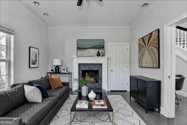 73 Atlanta Ave SW, Atlanta, GA 30315 - living room with baseboards, a fireplace, visible vents, and dark wood finished floors
