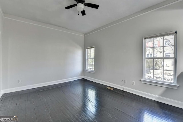 73 Atlanta Ave SW, Atlanta, GA 30315 - spare room with dark wood-type flooring, ceiling fan, and baseboards