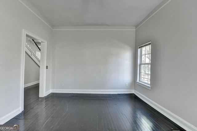 73 Atlanta Ave SW, Atlanta, GA 30315 - spare room with dark wood finished floors, baseboards, and ornamental molding
