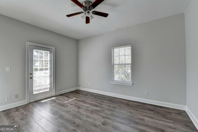 73 Atlanta Ave SW, Atlanta, GA 30315 - unfurnished room with a ceiling fan, baseboards, a healthy amount of sunlight, and wood finished floors