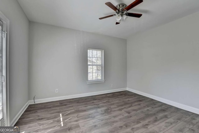 73 Atlanta Ave SW, Atlanta, GA 30315 - spare room featuring baseboards, ceiling fan, and wood finished floors