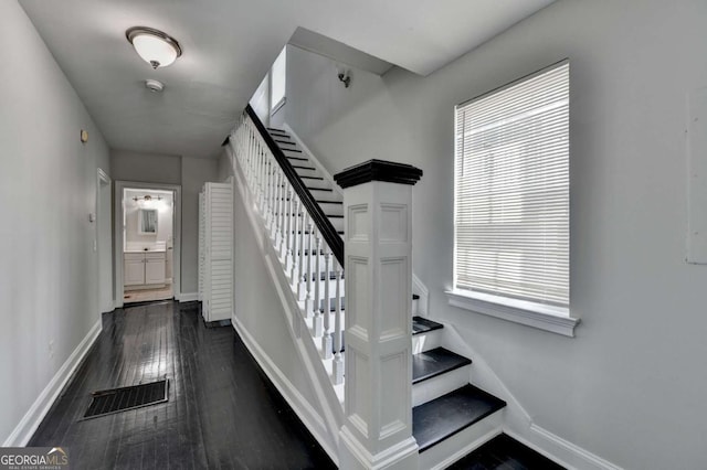 73 Atlanta Ave SW, Atlanta, GA 30315 - staircase featuring hardwood / wood-style floors, baseboards, and visible vents