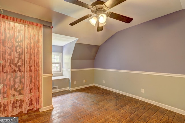 12 John Boy Trl, Newnan, GA 30263 - bonus room with lofted ceiling, wood-type flooring, ceiling fan, and baseboards