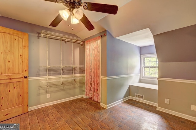 12 John Boy Trl, Newnan, GA 30263 - walk in closet with hardwood / wood-style floors, a ceiling fan, and vaulted ceiling