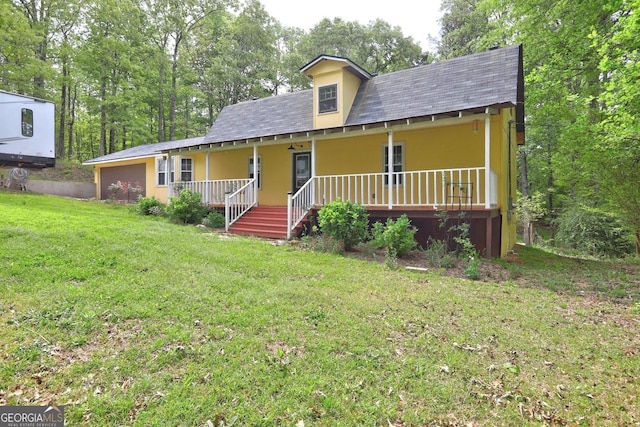 12 John Boy Trl, Newnan, GA 30263 - country-style home featuring covered porch, a front lawn, and roof with shingles