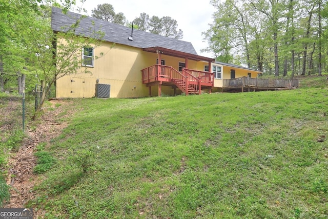 12 John Boy Trl, Newnan, GA 30263 - rear view of property with a wooden deck, a yard, roof with shingles, and crawl space