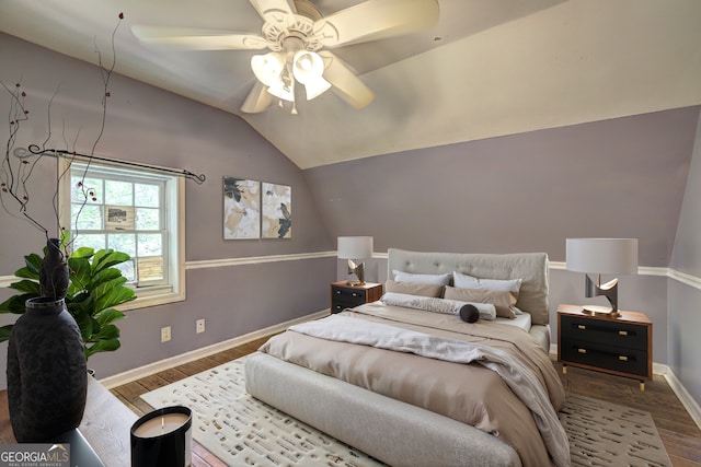 12 John Boy Trl, Newnan, GA 30263 - bedroom featuring wood finished floors, baseboards, and lofted ceiling