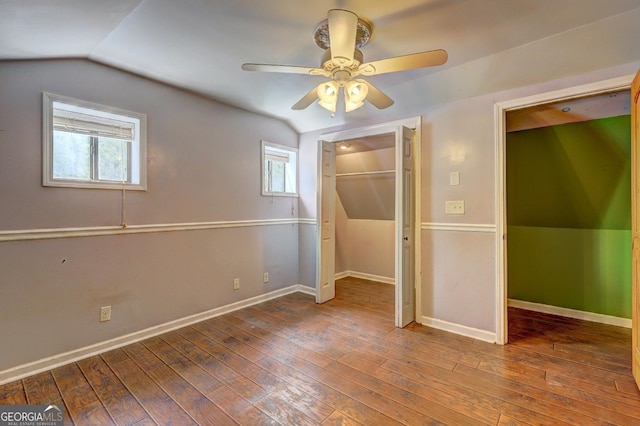 12 John Boy Trl, Newnan, GA 30263 - unfurnished bedroom featuring lofted ceiling, hardwood / wood-style flooring, multiple windows, baseboards, and ceiling fan
