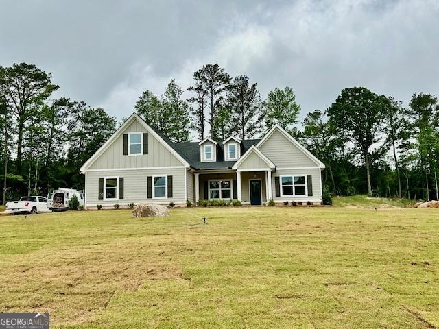 149 Sagebrook Ln Lot 8, Newnan, GA 30263 - craftsman-style home featuring board and batten siding and a front lawn