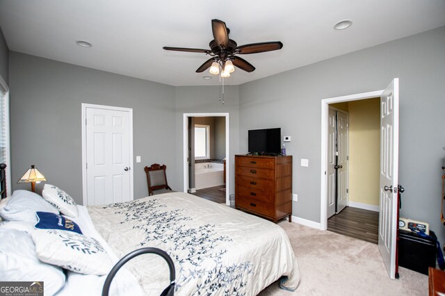 207 Meadow Lake Dr, Carrollton, GA 30116 - bedroom featuring light colored carpet, recessed lighting, connected bathroom, ceiling fan, and baseboards
