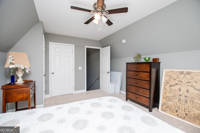 207 Meadow Lake Dr, Carrollton, GA 30116 - bedroom featuring lofted ceiling, carpet floors, baseboards, and ceiling fan