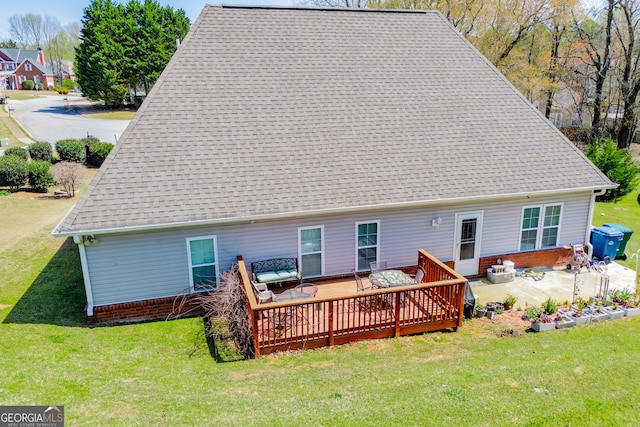207 Meadow Lake Dr, Carrollton, GA 30116 - back of house with a lawn, a deck, and a shingled roof