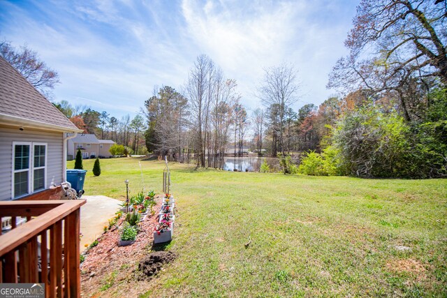 207 Meadow Lake Dr, Carrollton, GA 30116 - view of grassy yard featuring a water view